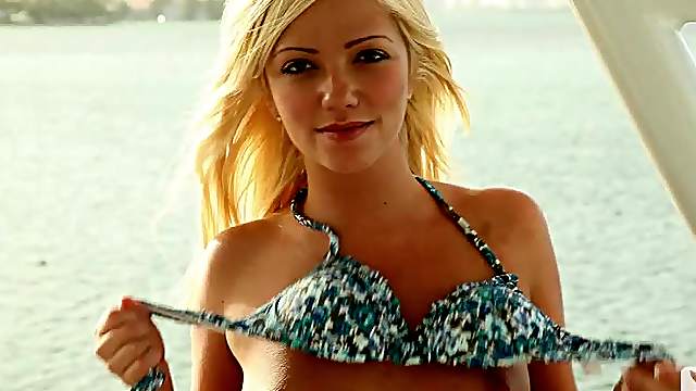 Lovely Kyndra McGaw shows her nude body on a boat