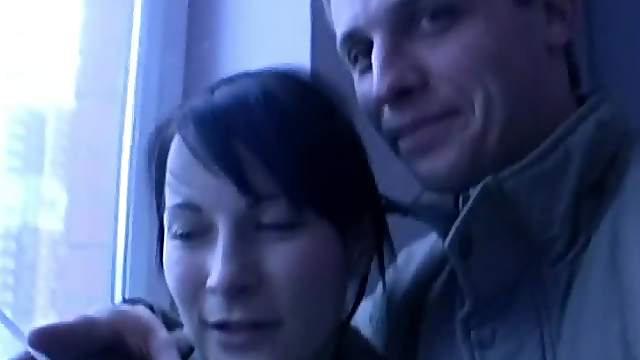 Short-haired brunette gives handjob and blowjob in the bathtub