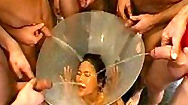 Nasty Asian Gets Fucked Hard and Pissed all Over Her Face By Several Dudes