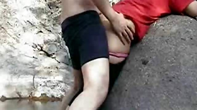 Sexy Indian babe bends over for him on the beach