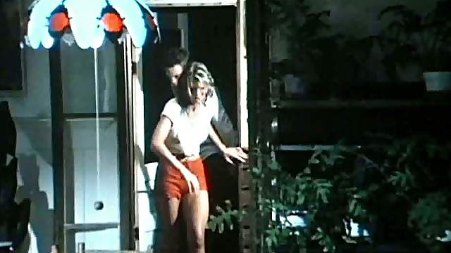 Cathy Lee Crosby and Michael Biehn In a Romantic Scene On The Beach
