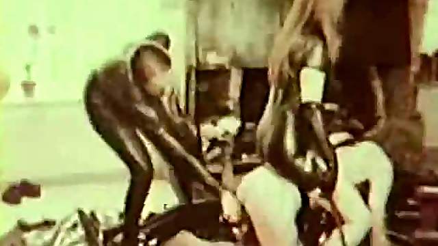 Latex Mistresses Punish Cumming Slave