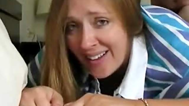 Brown-haired milf gets banged doggy style and moans loudly