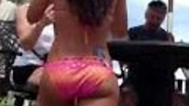 Girl with astonishing ass gets caught on a spy cam on a beach