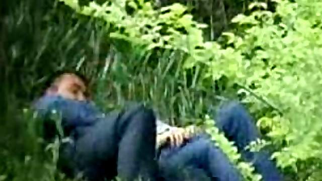 Horny couple feels an urge to caress each other in a park
