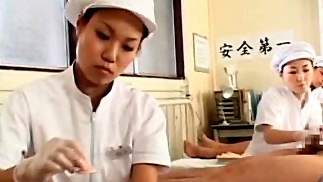 Asian nurses rubbing their patients hungry shafts