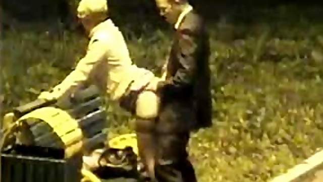 Mature hottie gets fucked from behind in a park at night