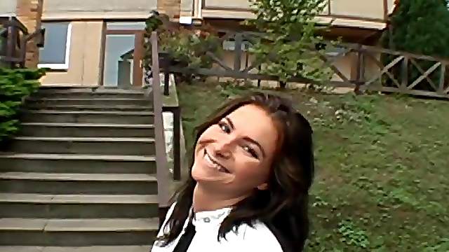 Playful brunette babe gives a blowjob to a stranger