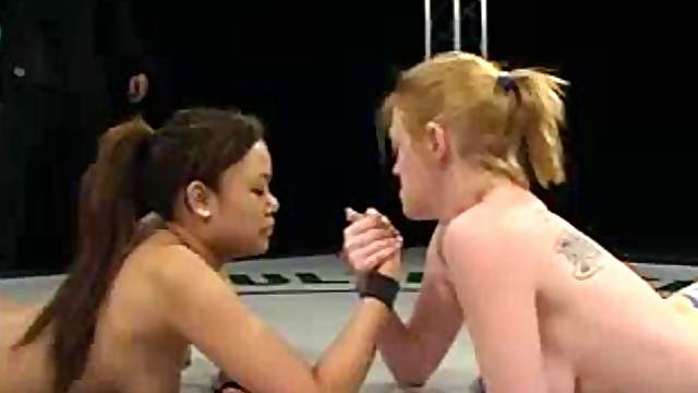 Annie Cruz gets toyed hard by busty Darling in a ring