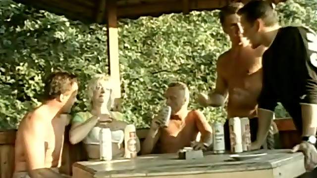 Mature Venus gets gangbaged in an arbor after a party