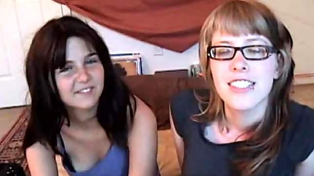 Nerdy girls in glasses lick and then toy their pussies