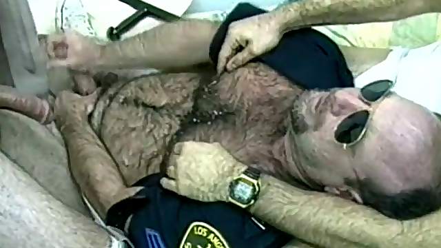 Horny Gay Bear Cop Sucking Some Big Criminal Cocks
