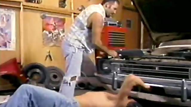 Sexy bear mechanic and a muscular hottie hook up