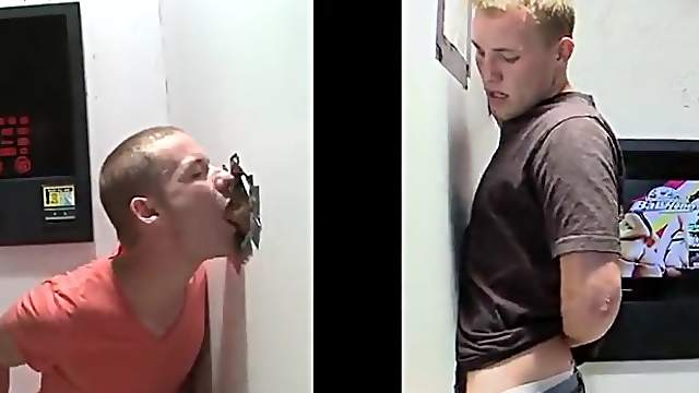 Adorable gay with short hair enjoying his massive cock being awarded with blowjob