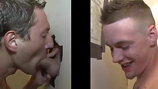 Charming masculine gay being awarded with blowjob through gloryhole