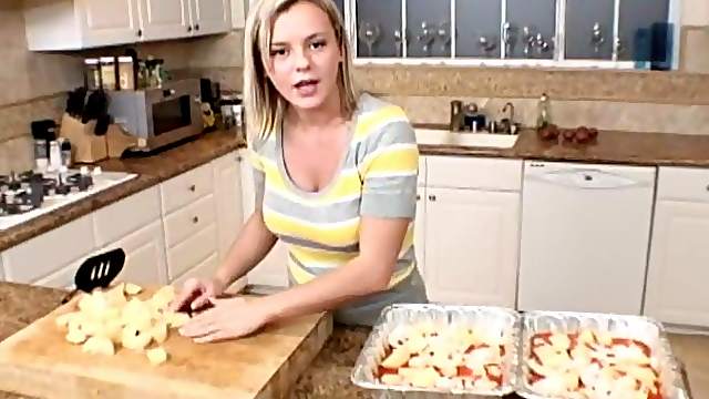 Bree Olson shows cleavage while cooking in her kitchen