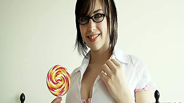Solo model in glasses shows natural tits and ass in an erotic scene