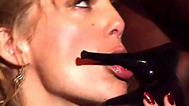Seductive lesbian cougars in stockings enjoying caressing their fake tits in close up shoot