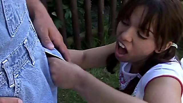 Kinky pigtailed brunette Carola gets fucked in the yard