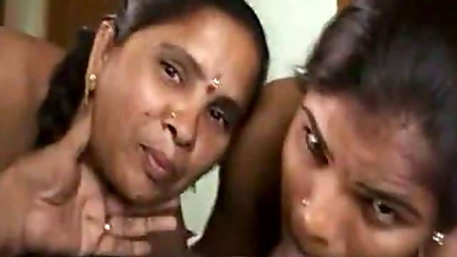 Two busty Indian bitches suck a prick in FFM video