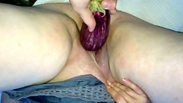 Chubby amateur skank gets her cunt fucked with an eggplant