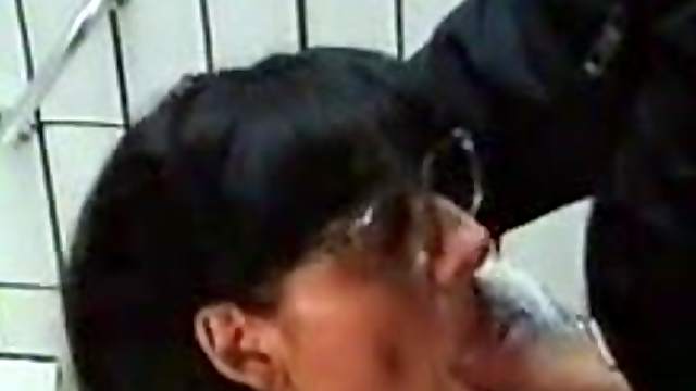 Nerdy mature brunette wearing glasses sucks a cock in homemade clip