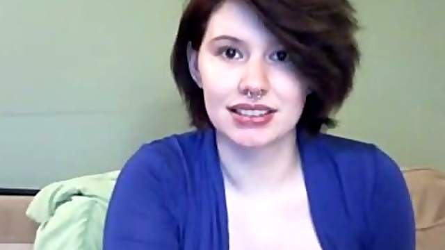 Pierced brunette shows her big natural tits and masturbates