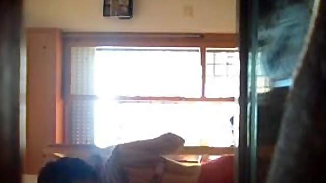 Chick changing her clothes gets caught on a hidden cam