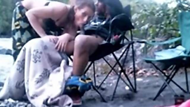 Black hippy gets his boner sucked by white milf outdoors
