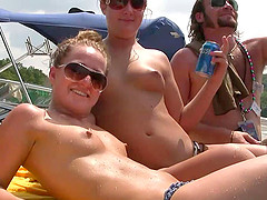 Randy chicks on the yacht party licking on natural tits