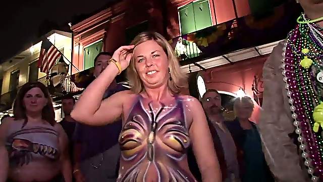 Party girls flashing their tits on the street for beads