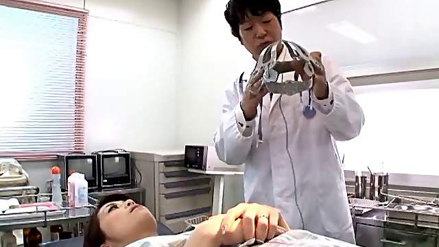 Asian dame getting her tits fiddled before moaning as her pussy is drilled using a toy