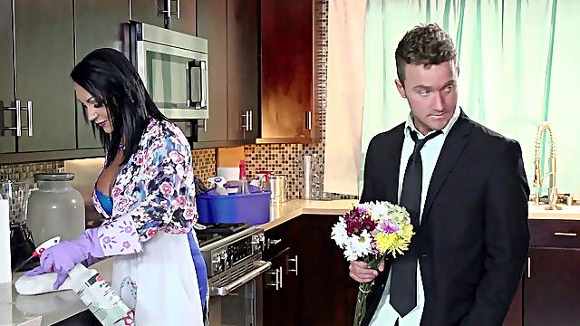 Naughty housewife serving her new friend in the kitchen