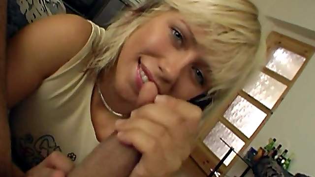 Cute blonde giving a beefy cock some breath-taking handjob