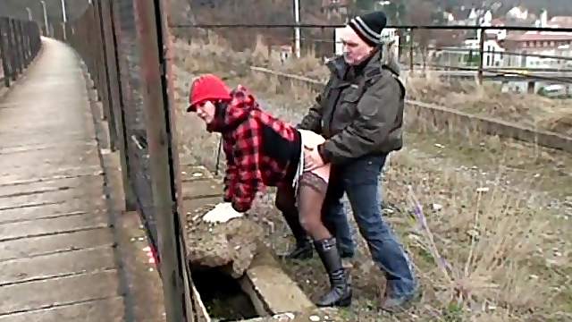 Wild cougar with a shaved pussy enjoying a hardcore fuck in public