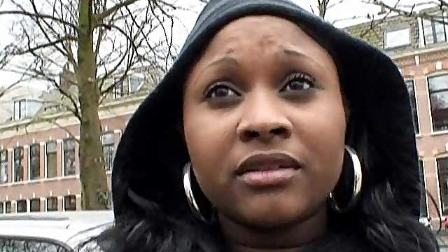 Ebony-skinned cougar with a chubby body sucking a big white cock