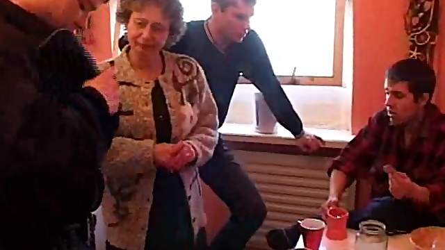 Horny granny gets fucked by multiple guys at the same time