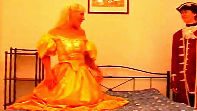 Icy hot redhead in a retro costume takes a cumshot after a hardcore humping