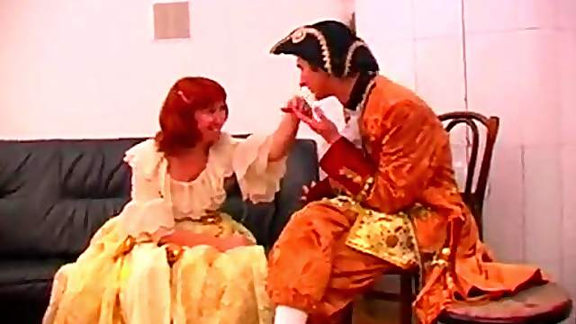 Mature redhead enjoys a wild doggy style humping in a cosplay clip