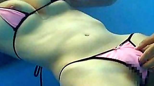 Yuma Asami has her bikini top pushed aside and nipples sucked