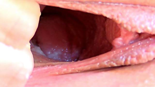 Blonde gapes her pussy during a self fisting clip