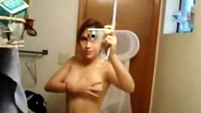 Sexy Brunette Showing Off Her Sexy Body in an Amateur Video