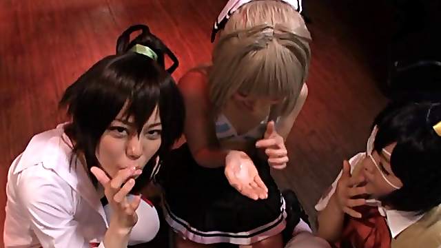 A group of Japanese girls in costumes gang suck a guy's cock