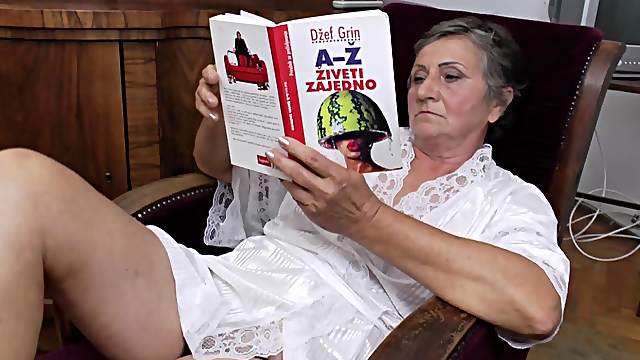 Granny feels very horny and decides to play with her hairy pussy