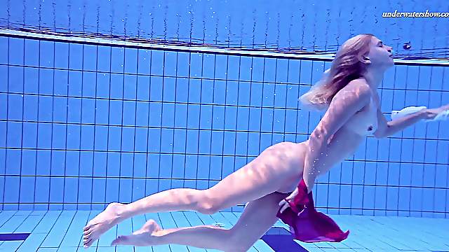 Gorgeous Russian blonde Elena Proklova shows her body in the pool