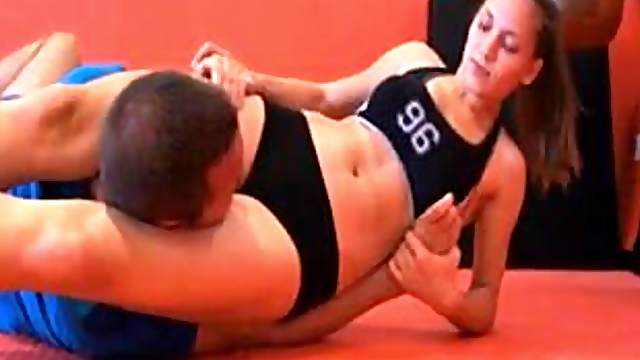 Strong Natalia owns James in a training session in the gym