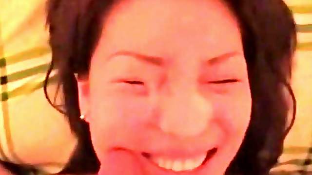 Asian bitch sucks passionately handjob for pov cam amateur