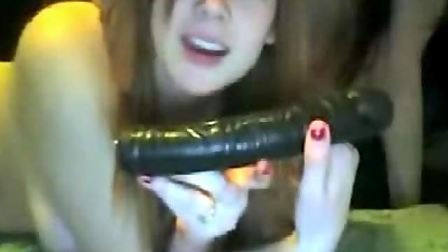 Hot brunette chick loving her big black dildo here