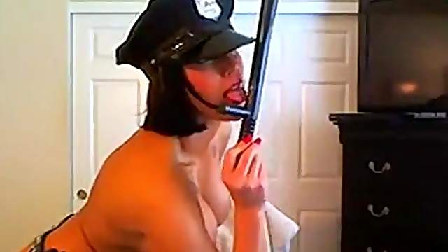 Busty police woman stripteasing and showing her big fleshy melons
