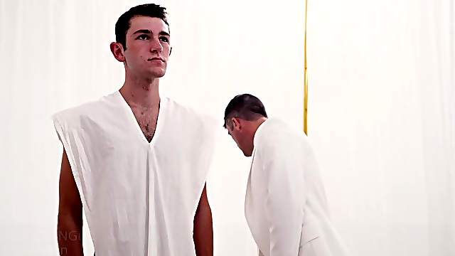 Handsome older priest fucks tall hairy boy in the temple